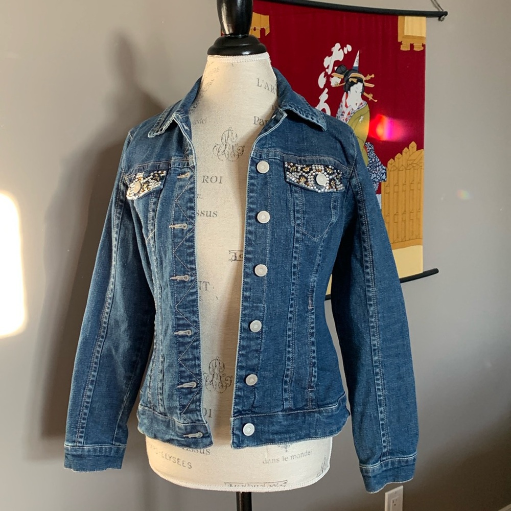 jean jacket. Decoration on front pockets size S.  Worn during stampede